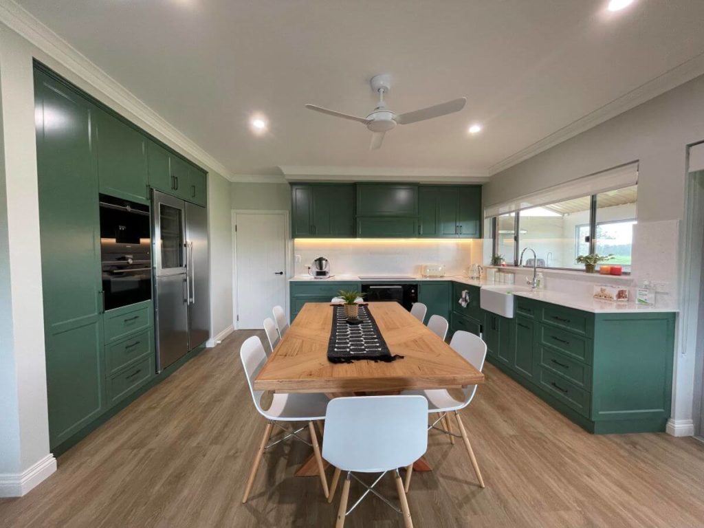 green kitchen and dining room