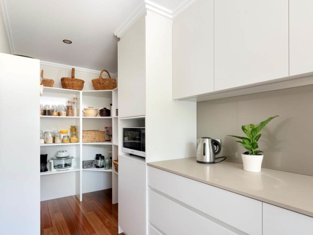 pantry and white bench 